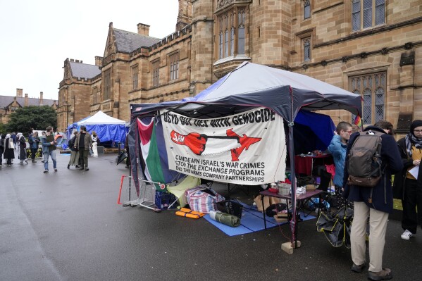 Protesting students occupy an area of the quadrangle at the University of Sydney in Sydney, Friday, May 3, 2024. Encampments have sprung up at colleges in major Australian cities as participants protest over the Israel-Hamas war in solidarity with student demonstrators in the United States. (AP Photo/Rick Rycroft)