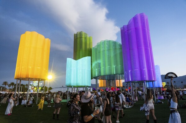 Festivalgoers are seen during the first weekend of the Coachella Valley Music and Arts Festival at the Empire Polo Club on Friday, April 11, 2025, in Indio, Calif. (Photo by Amy Harris/Invision/AP)