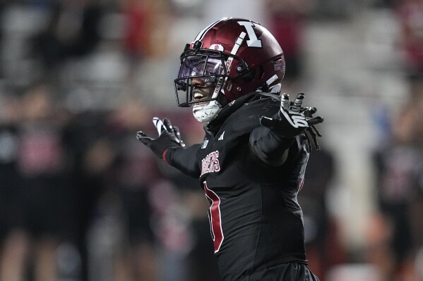 Indiana defensive back Noah Pierre gestures after Akron place-kicker Dante Jackson missed a field goal during the second half of an NCAA college football game Saturday, Sept. 23, 2023, in Bloomington, Ind. (AP Photo/Darron Cummings)