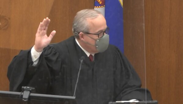 In this screen grab from video, Hennepin County Judge Peter Cahill presides over jury selection, Tuesday, March 23, 2021, in the trial of former Minneapolis police officer Derek Chauvin at the Hennepin County Courthouse in Minneapolis, Minn.   Chauvin is charged in the May 25, 2020, death of George Floyd.  (Court TV via AP, Pool)