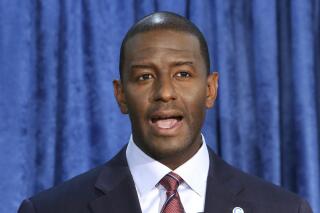 FILE - Andrew Gillum, Democratic candidate for Florida governor, speaks at a news conference in Tallahassee, Fla., Nov. 10, 2018. The former Florida Democratic gubernatorial candidate is on trial in federal court on charges of corruption and lying to the FBI, facing a potentially long prison sentence if convicted of multiple wire fraud counts and a conspiracy charge. (AP Photo/Steve Cannon, File)