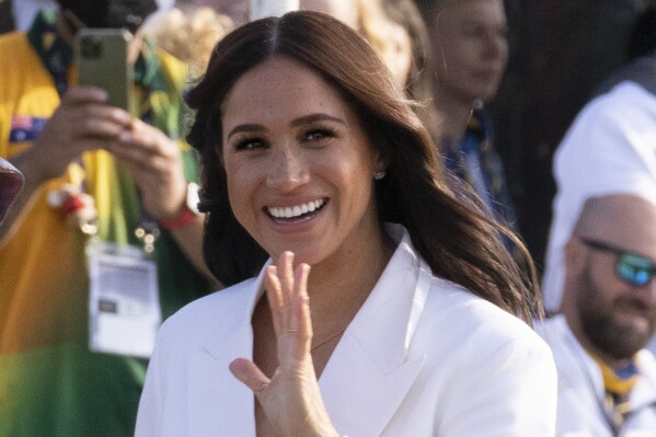 FILE - Meghan Markle, Duchess of Sussex, arrives at the Invictus Games venue in The Hague, Netherlands, Friday, April 15, 2022. Britain's press watchdog on Friday, June 30, 2023 found a column in the The Sun tabloid about hatred for Prince Harry’s wife, Meghan, was sexist. The December opinion piece by TV personality Jeremy Clarkson inspired a record number of complaints to the Independent Press Standards Organisation. (AP Photo/Peter Dejong, File)