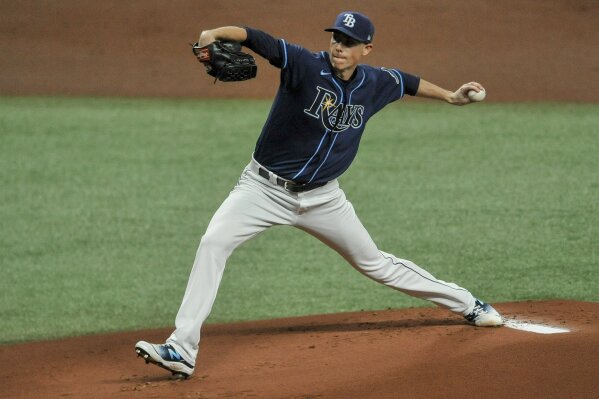 Tampa Bay Rays starter Ryan Yarbrough pitches against the Texas Rangers during the first inning of a baseball game Tuesday, April 13, 2021, in St. Petersburg, Fla. (AP Photo/Steve Nesius)