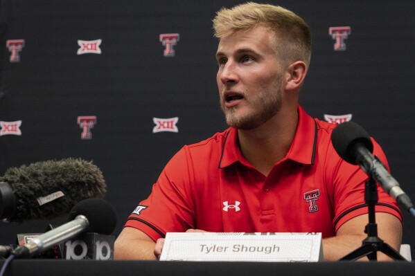 FILE - Texas Tech quarterback Tyler Shough takes questions at the NCAA college football Big 12 Media Days in Arlington, Texas, Thursday, July 13, 2023. Tyler Shough didn't expect to be Texas Tech's quarterback long enough to face his former team. Yet here he is, in a sixth season of college football, having just become the fifth Red Raiders QB since 1980 to start three consecutive openers, set to face No. 13 Oregon (1-0) in the home opener Saturday night.(Sara Diggins/Austin American-Statesman via AP, File)
