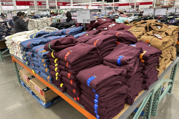 Shoppers peruse stacks of hoodies on display in a Costco warehouse Tuesday, Jan. 30, 2024, in Timnath, Colo. The Commerce Department releases U.S. retail sales data for January on Thursday, Feb. 15, 2024. (AP Photo/David Zalubowski)