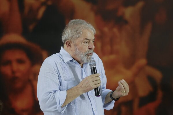 
              Former Brazilian President Luiz Inacio Lula da Silva speaks during a meeting with the executive members of the Workers Party, in Sao Paulo, Brazil, Thursday, Jan. 25, 2018. Lula said he will run for president again, even after an appeals court unanimously upheld a graft conviction against him and added years to his prison sentence.(AP Photo/Andre Penner)
            
