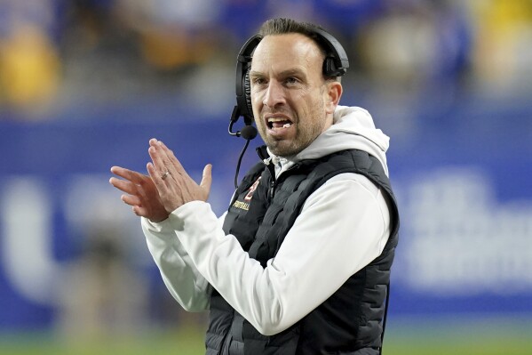 FILE - Boston College coach Jeff Hafley applauds during the first half of the team's NCAA college football game against Pittsburgh, Thursday, Nov. 16, 2023, in Pittsburgh. Jeff Hafley is leaving his job as Boston College's head coach to become the Green Bay Packers' defensive coordinator. The Packers announced Wednesday, Jan. 31, 2024 that Hafley would be taking over for Joe Barry, who was fired last week after three seasons as Green Bay's defensive coordinator.(AP Photo/Matt Freed, File)