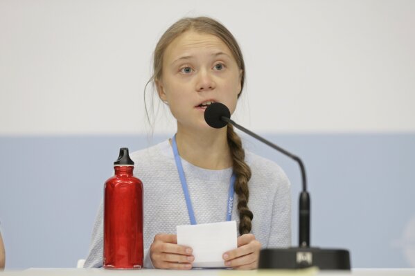 Climate activist Greta Thunberg speaks during a news conference at the COP25 climate summit in Madrid, Spain, Monday, Dec. 9, 2019. Thunberg is in Madrid where a global U.N.-sponsored climate change conference is taking place. (AP Photo/Andrea Comas)