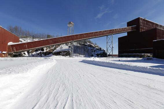 FILE - A former iron ore processing plant near Hoyt Lakes, Minn., that would become part of a proposed PolyMet copper-nickel mine, is pictured on Feb. 10, 2016. The Minnesota Supreme Court will hear oral arguments Wednesday, Nov. 30, 2022, on an attempt by environmental groups to cancel a key permit for the long-stalled PolyMet copper-nickel mine. (AP Photo/Jim Mone, File)
