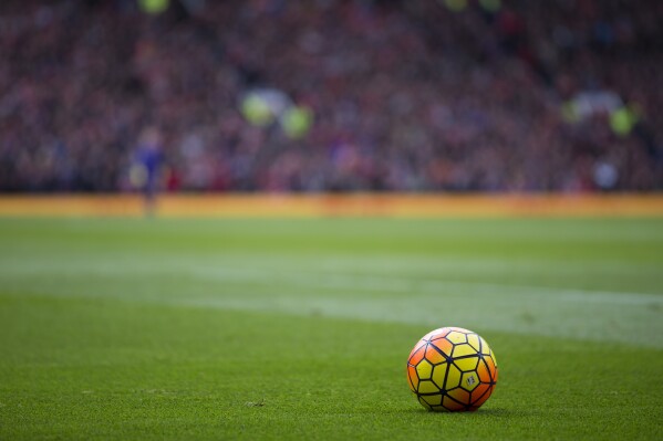 FILE - The ball is seen during the English Premier League soccer match between Manchester United and Manchester City at Old Trafford Stadium, Manchester, England, Sunday, Oct. 25, 2015. Plans to tighten regulation of owners of English soccer clubs will not rule out more state-backed takeovers, a UK government minister said Thursday, Feb. 29, 2024. (AP Photo/Jon Super, File)