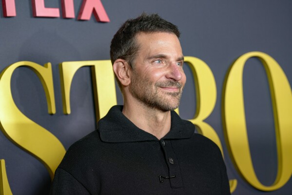 Bradley Cooper poses for photographers upon arrival at the screening of the film 'Maestro' on Friday, Dec. 1, 2023 in London. (Scott Garfitt/Invision/AP)