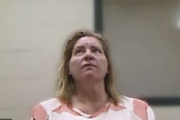FILE - In this image made from video provided by the Utah State Courts, Jodi Hildebrandt is seen during a virtual court appearance, Sept. 8, 2023, in St. George, Utah. Hildebrandt and Ruby Franke were charged with six felony counts of aggravated child abuse after their arrests on Aug. 30 at Hildebrandt's house in the southern Utah city of Ivins. They remain jailed without bail. A 12-year-old boy said Hildebrandt used ropes to tie him up, according to search warrants made public this week. Hildebrandt's attorney was out of the office on Wednesday, Sept. 20, and not available to comment on the boy's allegations. (Utah State Courts via AP, File)