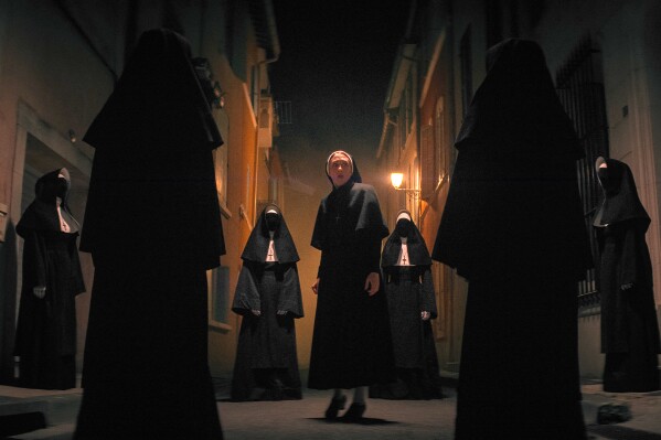 This image released by Warner Bros. Pictures shows Taissa Farmiga as Sister Irene in New Line Cinema's horror thriller "The Nun II." (Warner Bros. Pictures via AP)