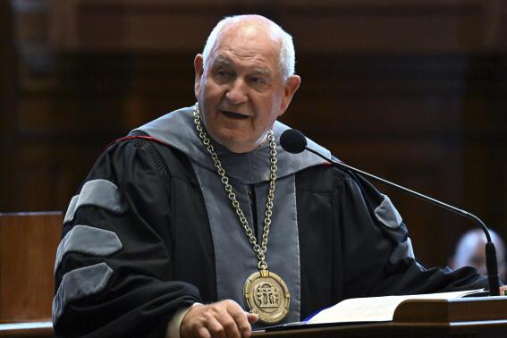 FILE - Sonny Perdue, the 14th chancellor of the University System of Georgia, speaks during his Investiture Ceremony at the House of Representatives Chamber at the State Capitol in Atlanta, Friday, Sept. 9, 2022. Perdue told the state Board of Regents on Wednesday, April 19, 2023, that he hoped lawmakers would restore a $66 million funding cut as regents delayed setting tuition rates while they figured out how to balance the system's $9 billion budget. (Hyosub Shin/Atlanta Journal-Constitution via AP, File)
