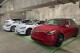 This photo provided by Edmunds shows a line of parked Tesla Model 3 and Model Y vehicles. The shopping and research process when buying your first used Tesla can be more involved than what's required for a typical gas-powered car. (Courtesy of Edmunds via AP)