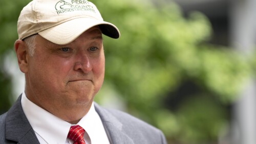 Former Ohio House Speaker Larry Householder walks to the Potter Stewart Federal Courthouse for his sentencing hearing, Thursday, June 29, 2023, in Cincinnati. Householder was sentenced to 20 years in prison, plus one year of probation, for his role in the largest corruption scandal in state history. (Albert Cesare/The Cincinnati Enquirer via AP)