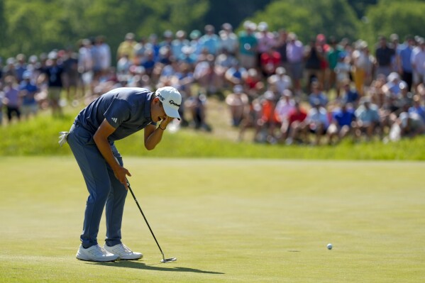 Collin Morikawa reacts after missing a putt on the seventh hole during the final round of the PGA Championship golf tournament at the Valhalla Golf Club, Sunday, May 19, 2024, in Louisville, Ky. (AP Photo/Matt York)