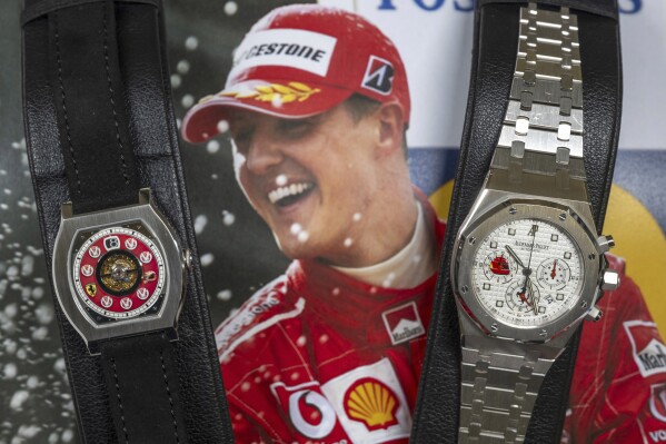 Two watches belonging to Michael Schumacher are on display: F.P., left, Journe, Invenit et Fecit, piece Unique, Vagabondage 1 Model, it is estimated to sell between 1,200,000 to 2,300,000 US dollars and Audemars Piguet, right, Royal OAK Chronograph model, it is estimated to sell between 180,000 to 280,000 US dollars, during a preview at the Christie's, in Geneva, Switzerland, Thursday, May 9, 2024. Eight luxury watches belonging to Formula One great Michael Schumacher are going up for sale at Christie’s on Tuesday, May 14, 2024. (Martial Trezzini/Keystone via AP)