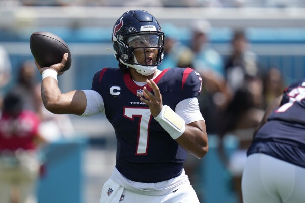 Houston Texans quarterback C.J. Stroud (7) throws against the Jacksonville Jaguars during the first half of an NFL football game, Sunday, Sept. 24, 2023, in Jacksonville, Fla. (AP Photo/John Raoux)