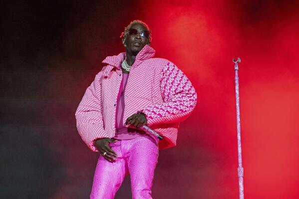 FILE - Rapper Young Thug performs on Day 4 of the Lollapalooza Music Festival, Aug. 1, 2021, at Grant Park in Chicago. Young Thug, accused by prosecutors of cofounding a criminal street gang responsible for violent crimes and using his songs and social media to promote it, is set to go to trial starting Monday, Jan. 9, 2023. (Photo by Amy Harris/Invision/AP, File)