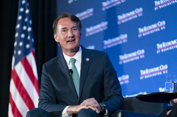 FILE - Virginia Gov. Glenn Youngkin speaks during an interview, Sept. 26, 2023, in Washington. Conjecture that Youngkin, who is set to host a major donor retreat Tuesday, Oct. 17, and Wednesday, Oct. 18, might make a late entry into the 2024 presidential race has only grown since his victory nearly two years ago and could further escalate after next month’s high-stakes legislative elections, where he’s aiming for a GOP sweep. (AP Photo/Stephanie Scarbrough, File)