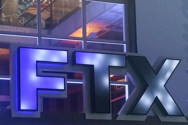 FILE - The FTX Arena logo is seen where the Miami Heat basketball team plays on Nov. 12, 2022, in Miami. The former CEO of failed crypto firm FTX Sam Bankman-Fried has been arrested in the Bahamas at the request of the U.S. government, the U.S. attorney’s office in New York said Monday, Dec. 12. (AP Photo/Marta Lavandier, File)