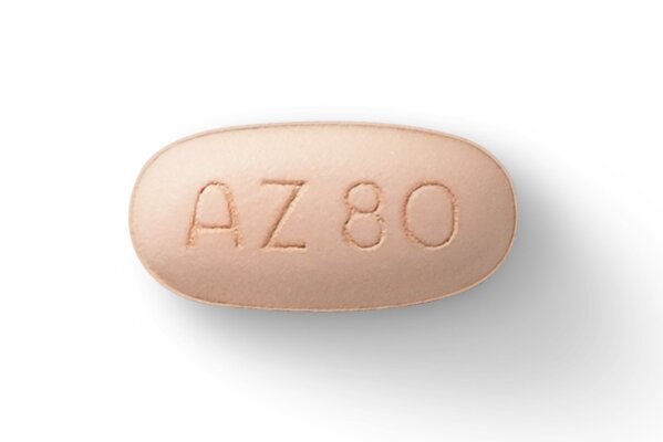 This image provided by AstraZeneca in May 2020 shows a pill of company's medication Tagrisso. On Friday, May 29, 2020, doctors are reporting success with newer drugs that control certain types of cancer better, reduce the risk it will come back and make treatment simpler and easier to bear. Tagrisso is approved for treating advanced lung cancer, and “the excitement now is moving this earlier” before the disease has widely spread, said Dr. Roy Herbst of the Yale Cancer Center, who has consulted for the drug’s maker. (AstraZeneca via AP)