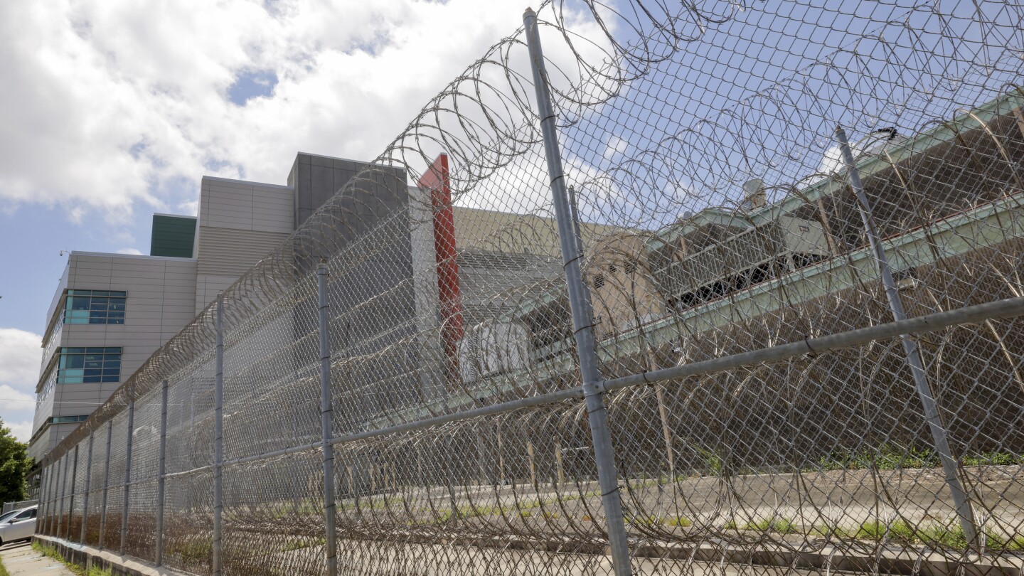 New Orleans jail worker thought he was unclogging a toilet, not helping 10 escape, lawyer says