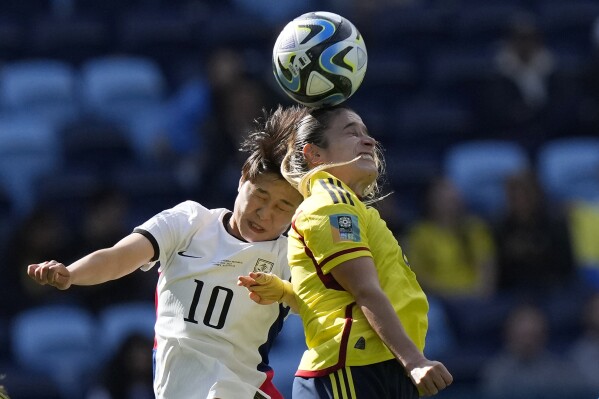 Colombia's Daniela Montoya, right, and South Korea's JI So-yun go for a header during the Women's World Cup Group H soccer match between Colombia and South Korea at the Sydney Football Stadium in Sydney, Australia, Tuesday, July 25, 2023. (AP Photo/Rick Rycroft)