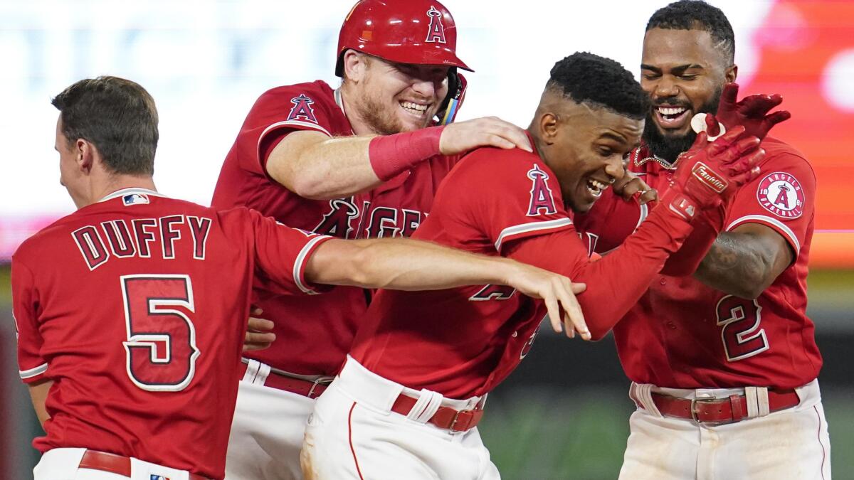 LA Angels blow lead, rally in 10th for 5-4 win over Tigers