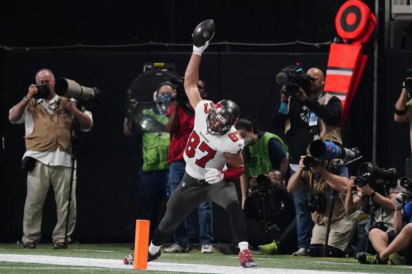 Tampa Bay Buccaneers tight end Rob Gronkowski (87) celebrates his touchdown against the Atlanta Falcons during the second half of an NFL football game, Sunday, Dec. 5, 2021, in Atlanta. (AP Photo/John Bazemore)
