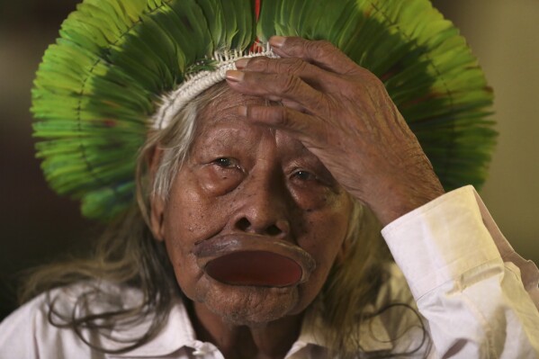 Indigenous Chief Raoni Metuktire gives an interview in Brasilia, Brazil, Wednesday, June 7, 2023. Not long after returning to Brazil in May 2023, the chief of the Kayapo severed ties with his Belgian acolyte, filmmaker Jean-Pierre Dutilleux. (AP Photo/Gustavo Moreno)