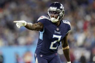 FILE - Tennessee Titans wide receiver Julio Jones (2) lines up for the snap during a Monday Night NFL football game against the Buffalo Bills on Oct. 18, 2021, in Nashville, Tenn. Jones has been activated from injured reserve, clearing the way for him to play Sunday against the Jacksonville Jaguars. (AP Photo/Matt Patterson, File)