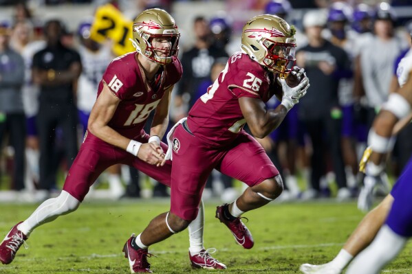 Louisville clinches ACC title berth vs. Florida State helped by Miami  penalties