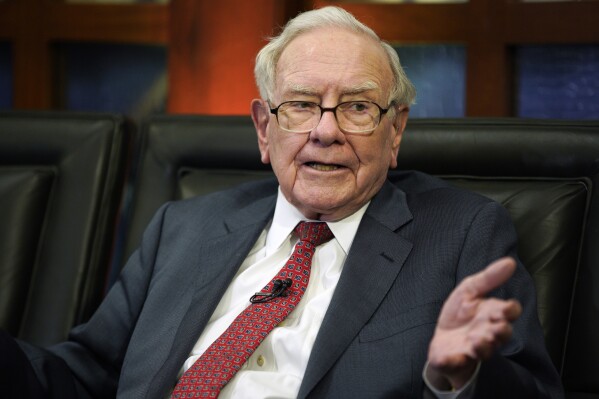 FILE - Berkshire Hathaway Chairman and CEO Warren Buffett speaks during an interview with Liz Claman on Fox Business Network's "Countdown to the Closing Bell," May 7, 2018, in Omaha, Neb. Everyone knows Buffett's successor won't be able to match the legendary investor, but Berkshire Hathaway's board remains confident that Greg Abel is the right guy to one day lead the conglomerate into the future. (AP Photo/Nati Harnik, File)