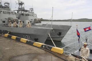 FILE - Cambodian navy crew stand on a patrol boat at the Ream Naval Base in Sihanoukville, southwest of Phnom Penh, Cambodia, July 26, 2019. The U.S. Treasury Department on Wednesday, Nov. 10, 2021, imposed sanctions imposed by the United States on two senior defense officials over allegations of graft, accompanied by a broader warning of systemic corruption in the Southeast Asian nation. (AP Photo/Heng Sinith, File)