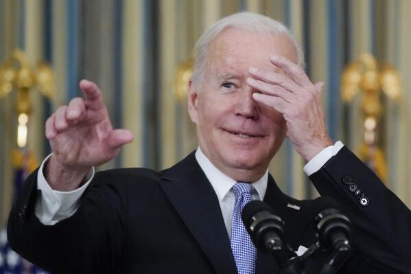 President Joe Biden jokes about which reporter to call on for a question as he speaks about the bipartisan infrastructure bill in the State Dinning Room of the White House, Saturday, Nov. 6, 2021, in Washington. (AP Photo/Alex Brandon)