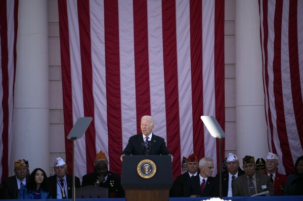 President Joe Biden speaks at the National Veterans Day Observance at the Memorial Amphitheater at Arlington National Cemetery in Arlington, Va., Saturday, Nov. 11, 2023. (AP Photo/Andrew Harnik)