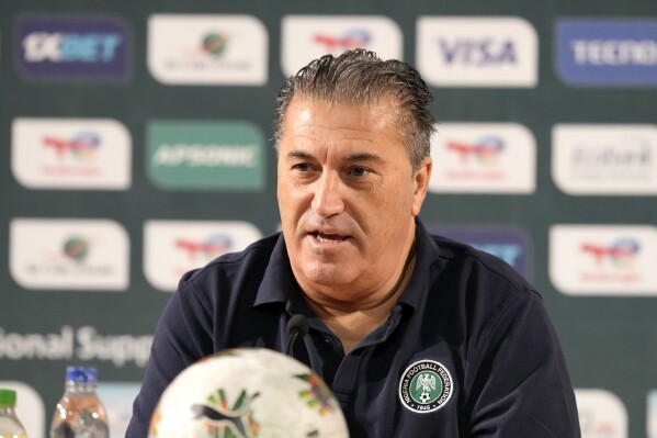 Nigeria's head coach Jose Peseiro speaks during a media conference in Abidjan, Ivory Coast, Friday, Jan. 26, 2024. Nigeria will play the African Cup of Nations round of 16 soccer match against Cameron on Saturday, Jan. 27, 2024. (AP Photo/Sunday Alamba)