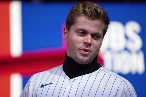 Chicago Cubs second baseman Nico Hoerner takes the stage on the opening day of the baseball team's fan convention Friday, Jan. 13, 2023, in Chicago. (AP Photo/Erin Hooley)