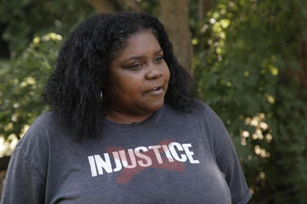 In this Monday, June 15, 2020 photo, Kristi Williams speaks during an interview at her home in Tulsa, Okla. Unlike Black Americans across the country after slavery, Williams' ancestors and thousands of other Black members of slave-owning Indian nations freed after the war “had land,” says Williams, a Tulsa community activist. “They had opportunity to build a house on that land, farm that land, and they were wealthy with their crops." (AP Photo/Sue Ogrocki)