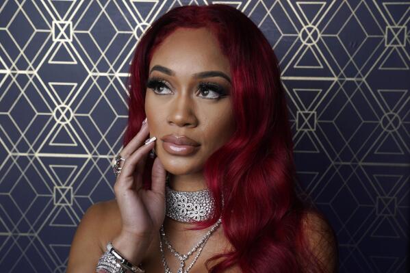Rapper Saweetie poses for a portrait at Nightingale Plaza in Los Angeles on Dec. 2, 2021. Saweetie was named one of AP's breakthrough entertainers of the year. (AP Photo/Chris Pizzello)