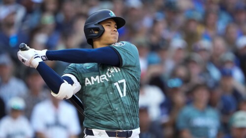 American League's Shohei Ohtani, of the Los Angeles Angels, swings at a pitch in the fourth inning during the MLB All-Star baseball game in Seattle, Tuesday, July 11, 2023. (AP Photo/Lindsey Wasson)