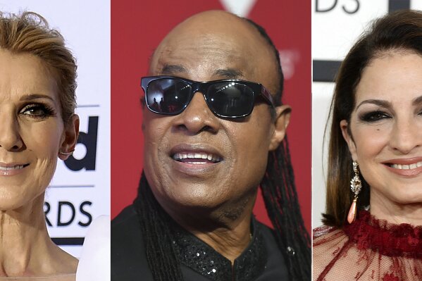 This combination photo shows performers, from left, Celine Dion, Stevie Wonder and Gloria Estefan, who are among the entertainers honoring nurses in a star-studded benefit virtual concert on Thanksgiving. Nurse Heroes Live will stream on the organization’s YouTube and Facebook along with LiveXLive on Nov. 26 at 7 p.m. EST. The benefit will provide money for a variety of programs including scholarships for nurses and their children. (AP Photo)