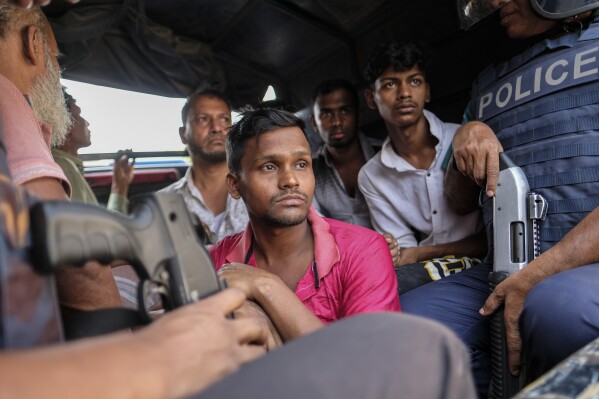 Police detain activists of main opposition Bangladesh Nationalist Party (BNP) who were trying to enforce a three-day blockade in Dhaka, Bangladesh, Tuesday, Oct.31, 2023. BNP has called for country-wide blockade to demand the resignation of Prime Minister Sheikh Hasina and the transfer of power to a non-partisan caretaker government to oversee general elections. (AP Photo/Mahmud Hossain Opu)