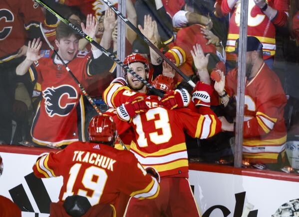 NHL playoffs: Rangers and Flames advance after Game 7 overtime