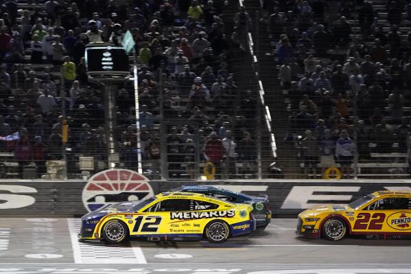 Ryan Blaney (12), Austin Cindric (2) and Joey Logano (22) take the green flag for the final restart of the NASCAR All-Star auto race at Texas Motor Speedway in Fort Worth, Texas, Sunday, May 22, 2022. (AP Photo/Larry Papke)