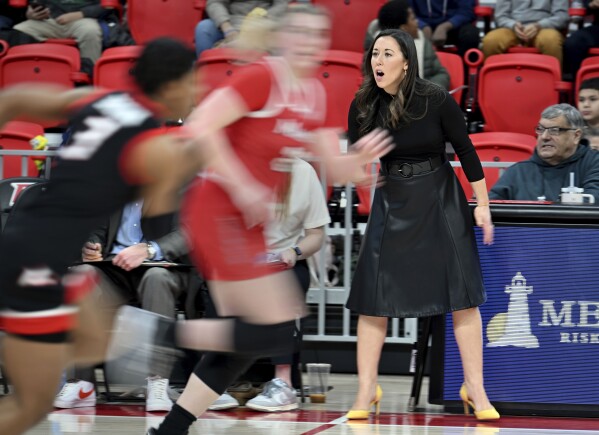 FILE -  Fairfield coach Carly Thibault-DuDonis directs her team during an NCAA college basketball game against Marist, Thursday, Feb. 8, 2024, in Fairfield, Conn. Thibault-DuDonis is in her second year as a head coach, leading Fairfield to a 22-1 record and a 20-game winning streak.(Cloe Poisson/Hartford Courant via AP, File)