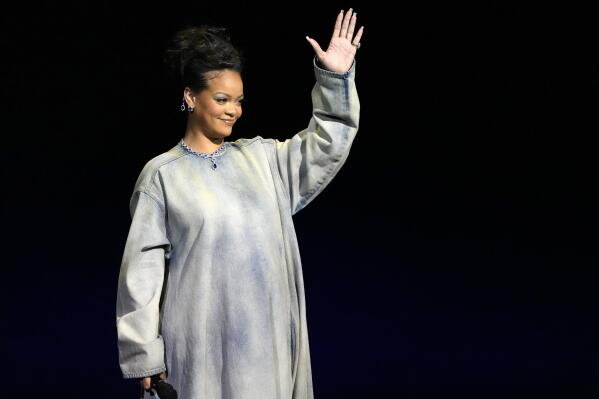 Rihanna, a cast member in the upcoming film "The Smurf Movie," waves to the audience during the Paramount Pictures presentation at CinemaCon 2023, the official convention of the National Association of Theatre Owners (NATO) at Caesars Palace, Thursday, April 27, 2023, in Las Vegas. (AP Photo/Chris Pizzello)