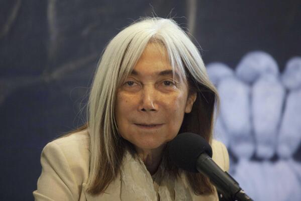 FILE - Maria Kodama, widow and heiress of Argentine author Jorge Luis Borges attends a press conference at the Palacio de Bellas Artes in Mexico City, July 30, 2012. Kodama has died on Sunday, March 26, 2023. (AP Photo/Alexandre Meneghini, File)